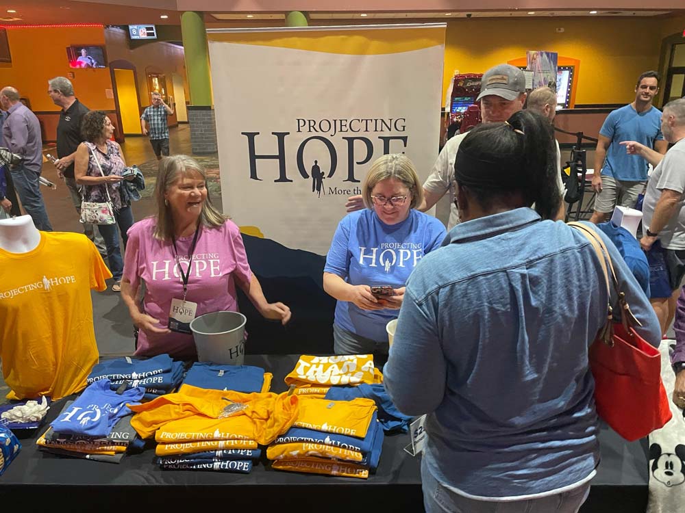 Projecting Hope volunteers serving at an event